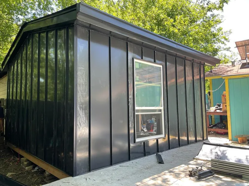 Black standing seam metal wall panels for Metal Roof Installation in Macclenny